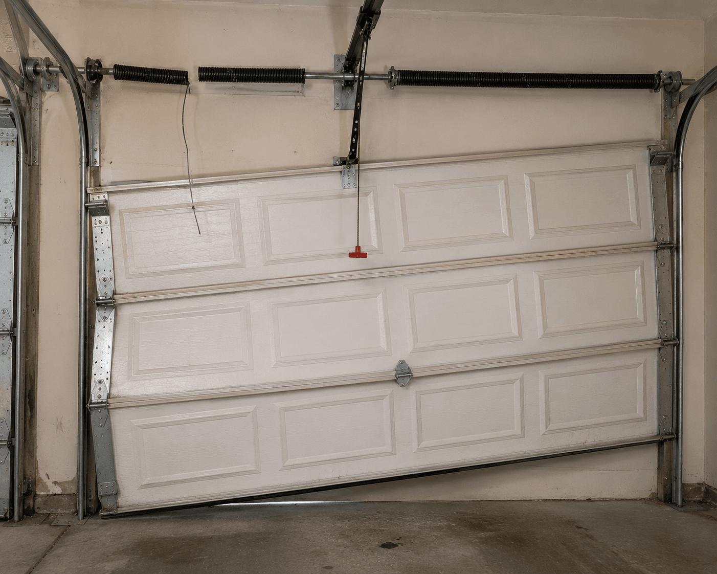 Damaged garage door before professional repair