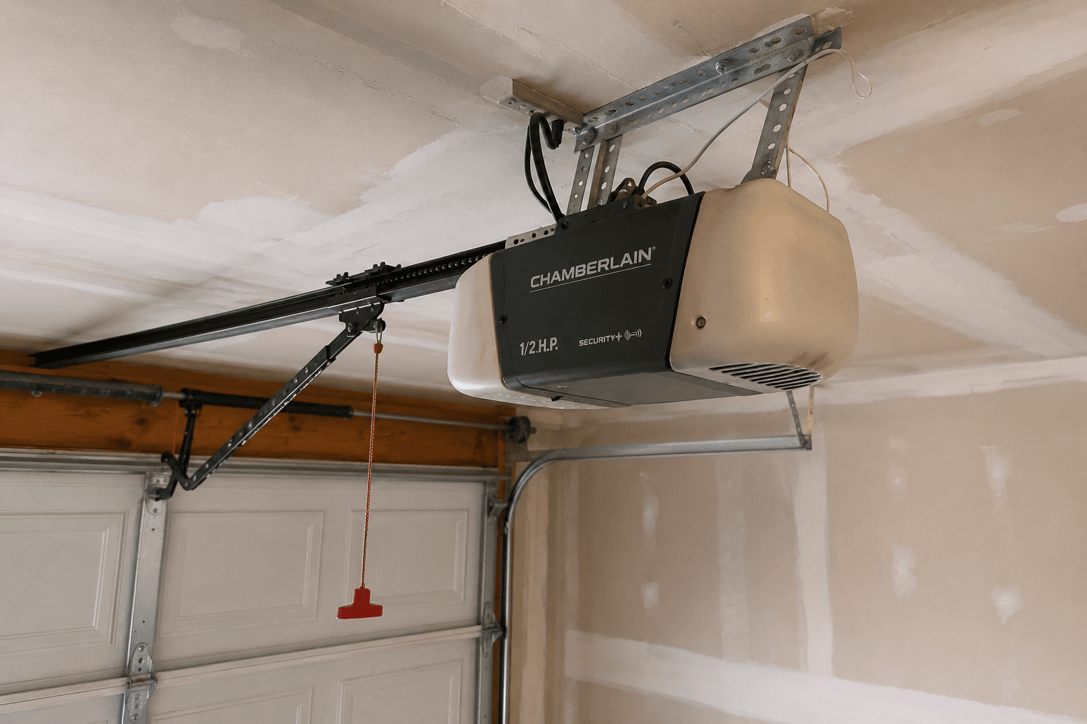 Before garage door opener replacement showing an older residential opener with intermittent performance near Valley Avenue