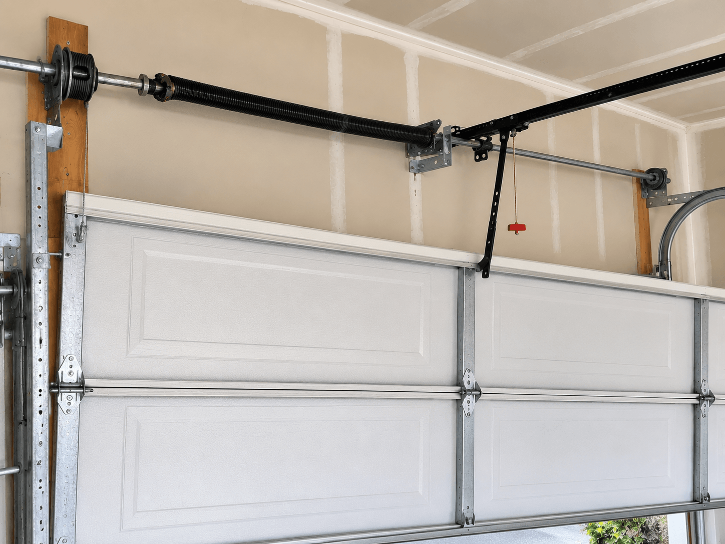After emergency cable repair showing a properly aligned garage door with a new lift cable installed in Bonney Lake