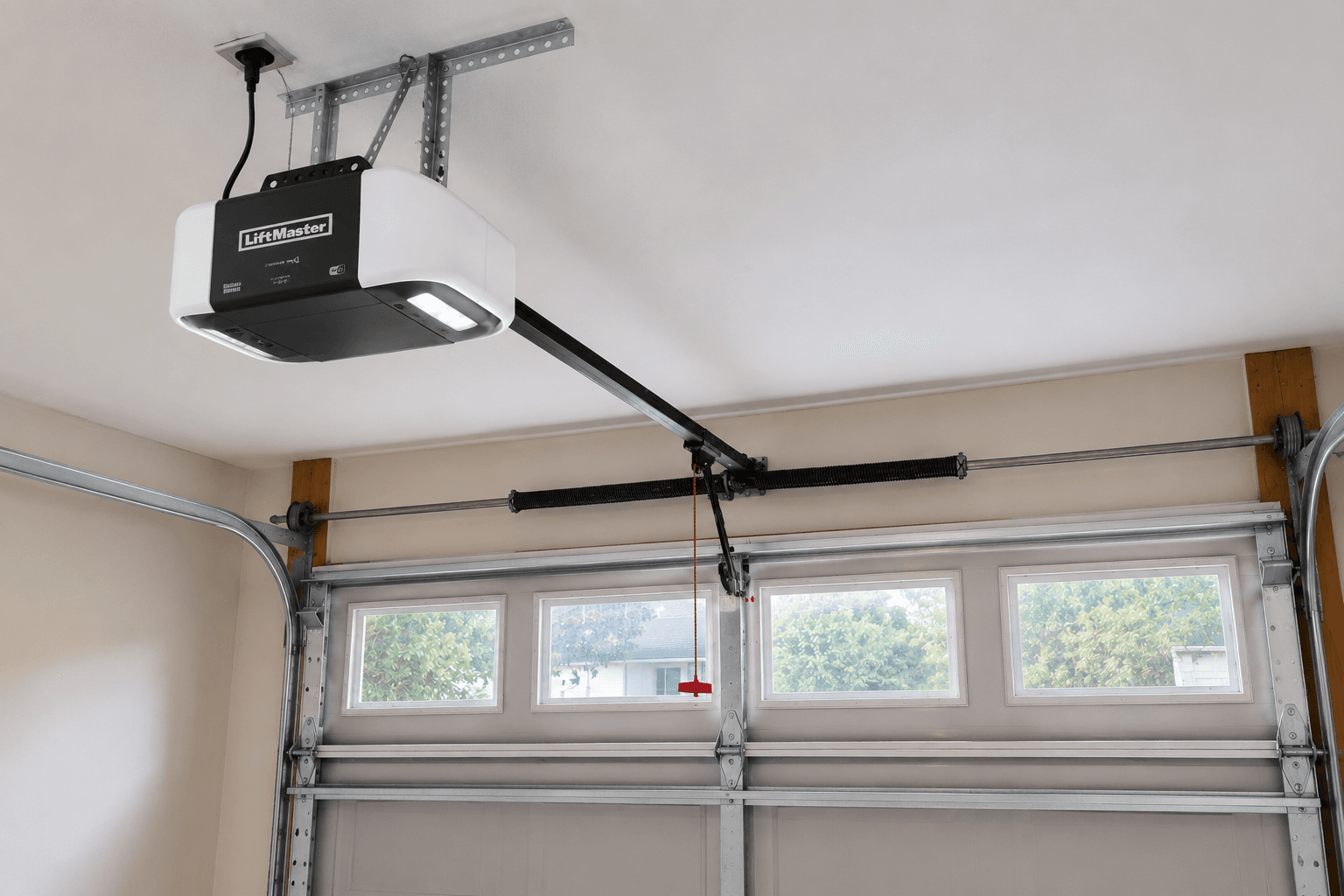 After garage door opener replacement featuring a modern ceiling-mounted garage door opener in a residential garage in Fircrest